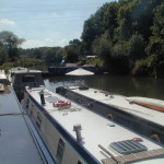 Jacaranda on left with boats moored up for the Lock & Weir Beer Festival